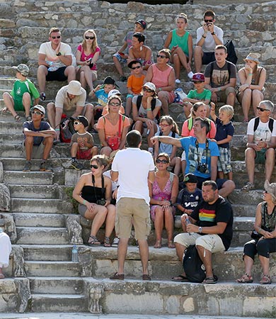 Tourists visit the ruins of Ephesus
